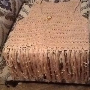Knit vest with broach